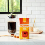 Dunkin'_Caramel_Me_Crazy_Flavored_Ground_Coffee,_11_Ounce_(Pack_of_1)