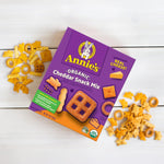 Annie's_Cheddar_Snack_Mix_With_Assorted_Crackers_and_Pretzels,_Made_with_Real_Cheese,_9_oz