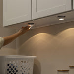 Amazon_Basics_LED_Puck_Lights,_Battery_Operated,_50_Lumens_2_Pack,_Tap_Light,_Stick_on_Lights,_Under_Cabinet_Lighting,_Ideal_for_Kitchen_Cabinets,_Closets,_Garage_and_More,_White