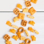 Annie's_Cheddar_Snack_Mix_With_Assorted_Crackers_and_Pretzels,_Made_with_Real_Cheese,_9_oz