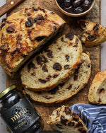 Mina_Dry_Cured_Black_Olives,_7_oz_-_Moroccan_Olive_Oil_Cured_Olives,_Premium_Handpicked_and_Naturally_Cured_Dried_Olives,_Non_GMO,_Gluten_Free,_Low_Carb,_Vegan,_Great_Paleo_Keto_Snacks