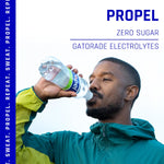 Propel,_Peach,_Zero_Calorie_Sports_Drinking_Water_with_Electrolytes_and_Vitamins_C&E,_16.9_Fl_Oz_(Pack_of_12)