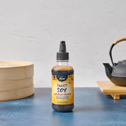 Simply_Asia_Drizzle_Sauce,_Sweet_Soy,_Savory,_Sweet_Sauce_for_Drizzling_on_Rice_Bowls,_Sticky_Rice,_Chicken_Skewers,_Sashimi,_Spring_Rolls,_Egg_Rolls,_Sushi,_Stir-Fry,_and_More,_8_fl_oz