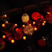 Homemory_Halloween_12_Pack_Orange_Tea_Light_Candles,_Battery_Operated_LED_Tealights,_Small_Pumpkins_Lights,_Flameless,_Electric_Fake_Tea_Candles,_1.4