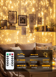Brightown_300_LED_Fairy_Curtain_Lights,_Warm_White/Purple/White/Pink__Curtain_String_Lights,_USB_Plug_in_8_Lighting_Modes_Christmas_Decoration,_Hanging_Lights_with_Remote_for_Bedroom_Indoor_Weddings_Dorm