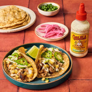 Cholula_Cremosa_Sauce,_Cilantro_Lime,_Mild_Heat,_Creamy_Squeezable_Topping_for_Tacos,_Enchiladas,_Soup,_Tostadas,_Eggs_and_More,_8_fl_oz