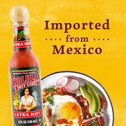 Cholula_Hot_Sauce,_Extra_Hot,_Product_of_Mexico,_Blend_of_Arbol_&_Piquin_Peppers_for_Bringing_Extra_Hot_Heat_to_Tacos,_Eggs,_Pizza_and_More,_5_fl_oz