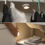 Amazon_Basics_LED_Puck_Lights,_Battery_Operated,_50_Lumens_2_Pack,_Tap_Light,_Stick_on_Lights,_Under_Cabinet_Lighting,_Ideal_for_Kitchen_Cabinets,_Closets,_Garage_and_More,_White