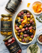 Mina_Dry_Cured_Black_Olives,_7_oz_-_Moroccan_Olive_Oil_Cured_Olives,_Premium_Handpicked_and_Naturally_Cured_Dried_Olives,_Non_GMO,_Gluten_Free,_Low_Carb,_Vegan,_Great_Paleo_Keto_Snacks