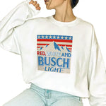 Red White Busch Light American flag mountain 4th of July unisex T-shirt sweatshirt hoodie celebrating USA Independence Day with a striking design